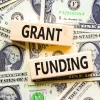 grants grant funding money dollar bills
