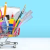 school supplies in a shopping cart