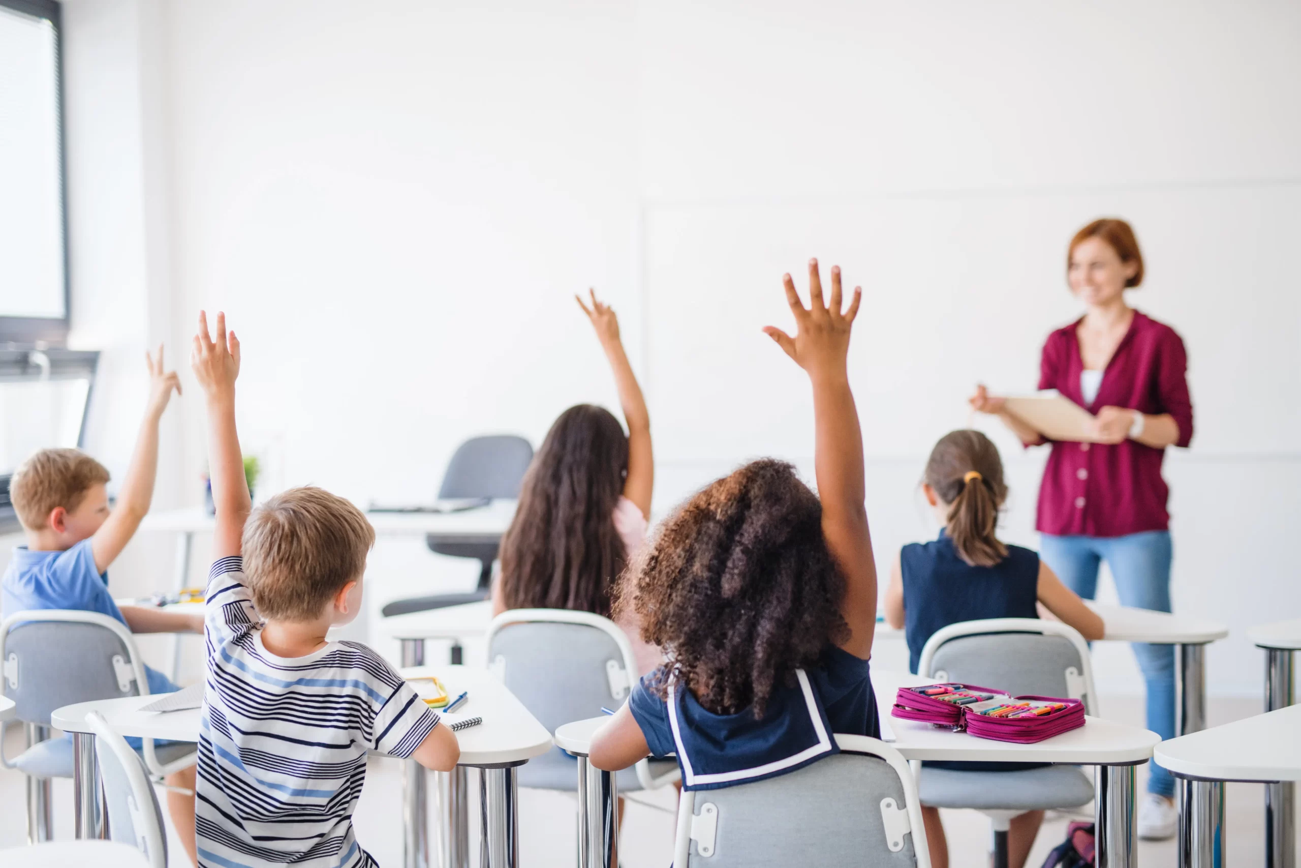 Education schools raised hands