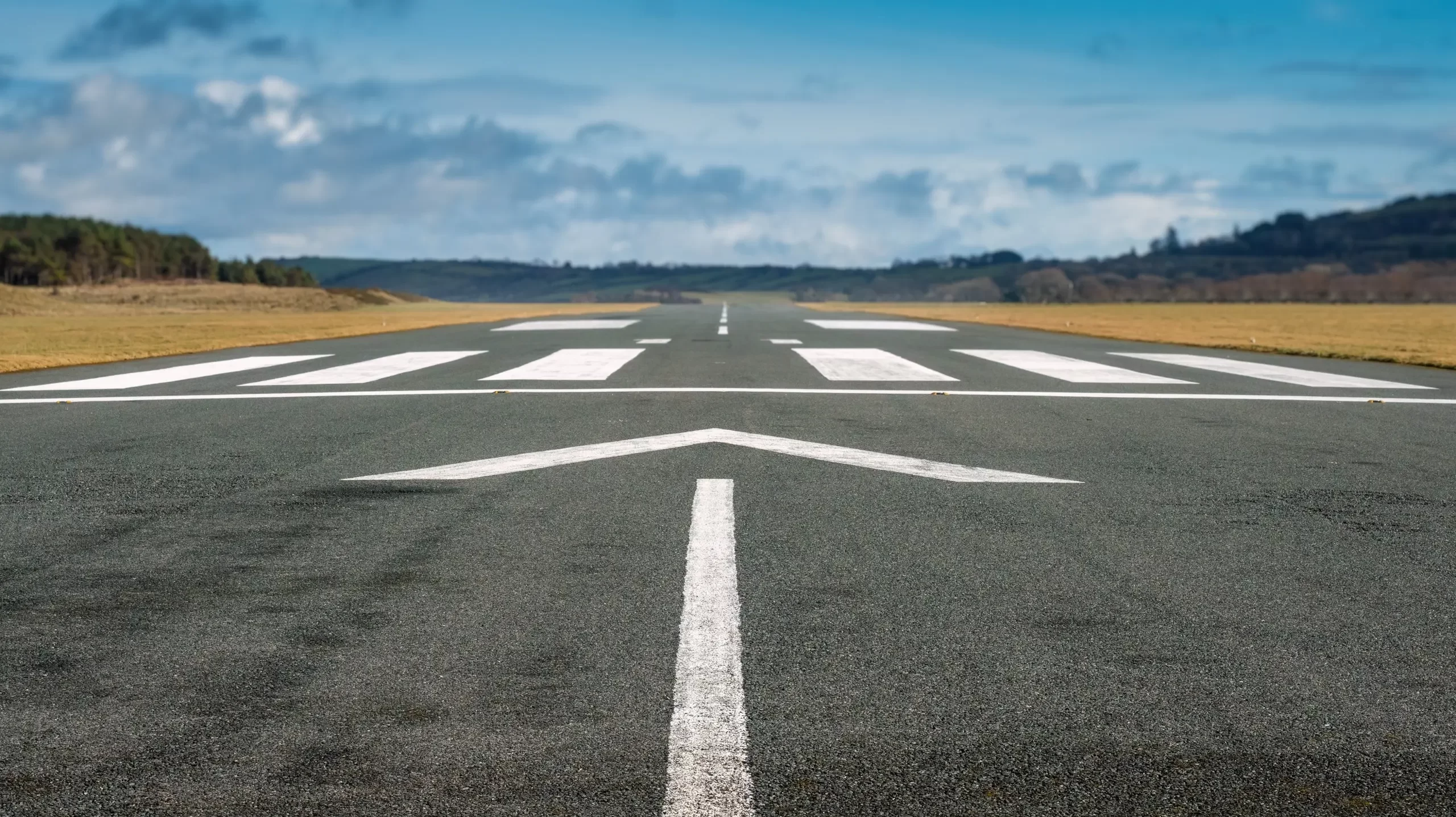 A small airport asphalt runway.