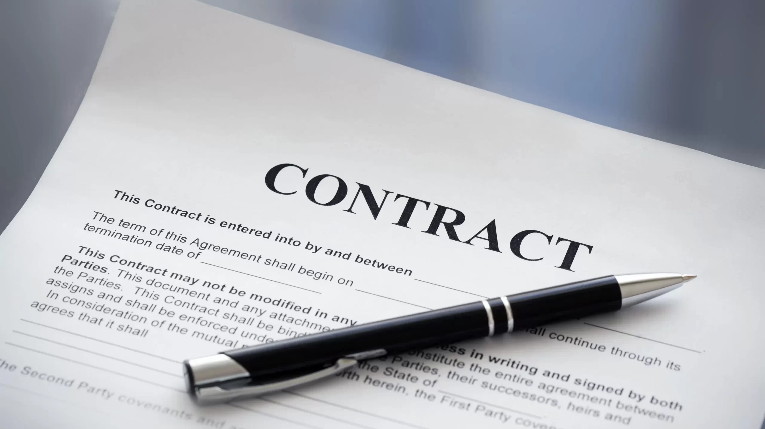 Pen on the contract papers